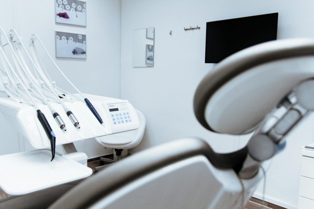 Leading Dental Technology Bright dental office showcasing modern equipment and clean, sleek design.
