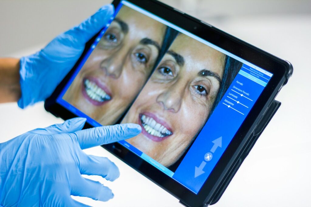 Leading Dental Technology man in blue shirt smiling